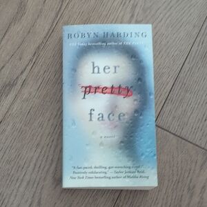 Her Pretty Face by Robyn Harding - Light Blue Paperback